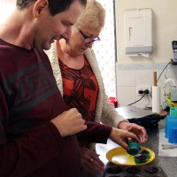 Scott and mum, Jan, cooking muffins.