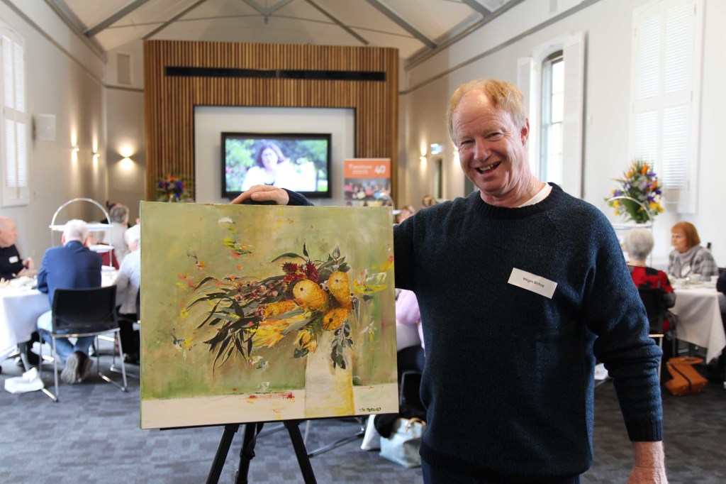 Wayen was delighted to win the Raffle Prize