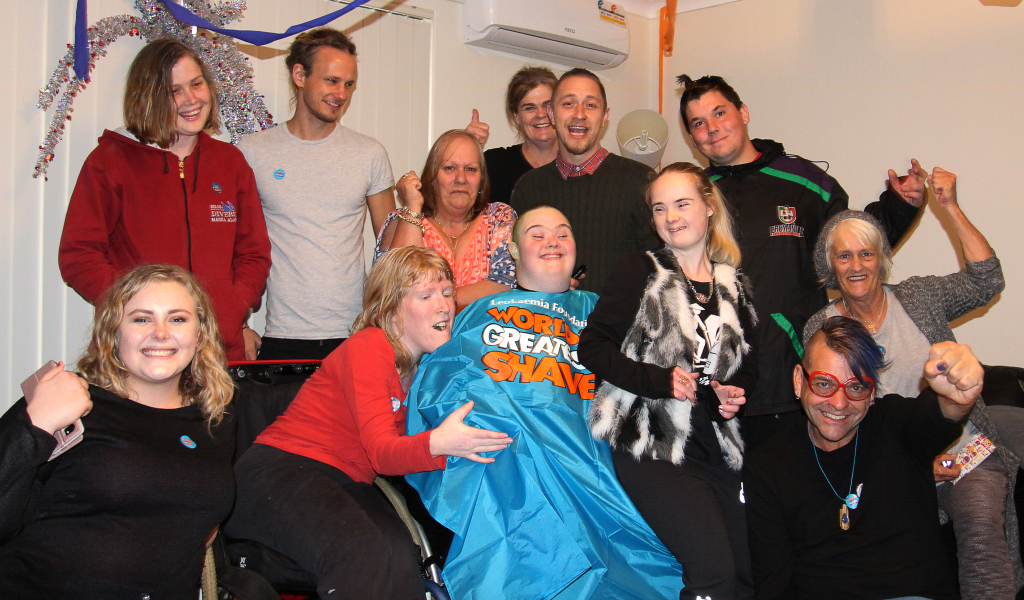 Dale's friends and family celebrate his fundraising success...and new haircut!