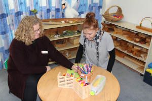 Tiffany working in the Early Childhood Centre with Tafe staff member, Tamara Devlin.